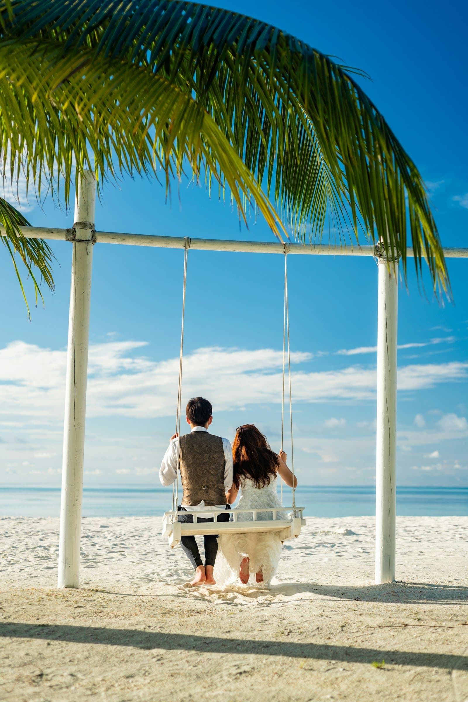 Beach swing overlooking the sea